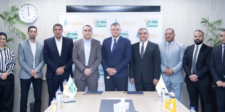 تعاون بين الأهلي ممكن والبريد لتوسيع نطاق الشمول المالي وتعزيز التحول الرقمي